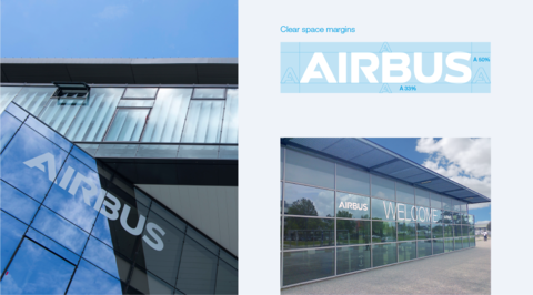 White Airbus logo on glass facades