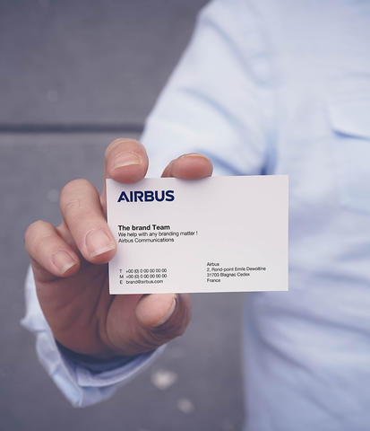 Showing the brand team's business card